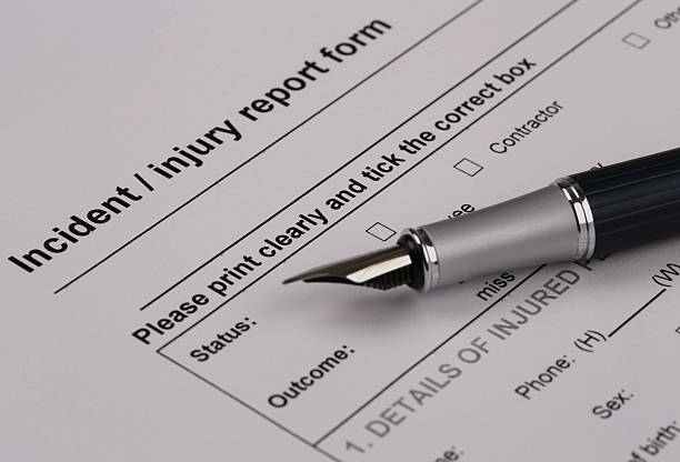Incident injury report form on a clipboard